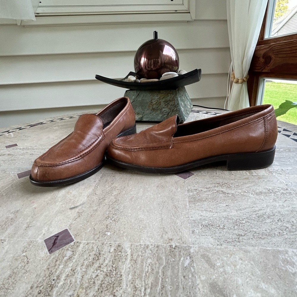 Brown leather flats
